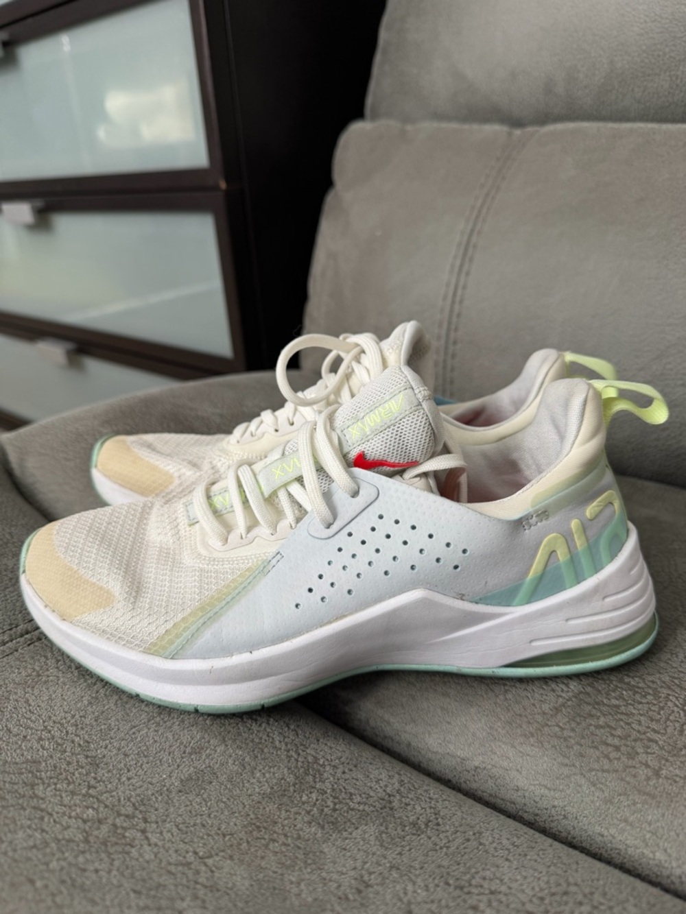 Nike Women's White Athletic Sneakers with Pastel Green and Cream Accents
